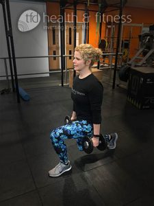 Weighted walking lunges for glute workout