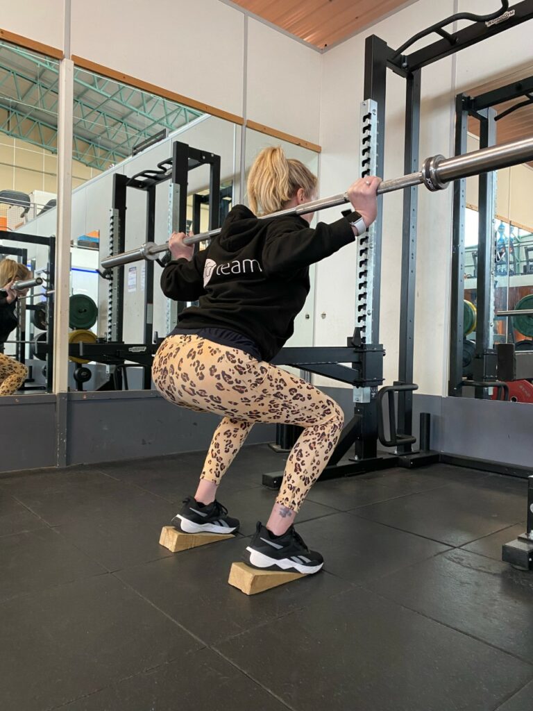 Heel Elevated Squat Tfd Gym